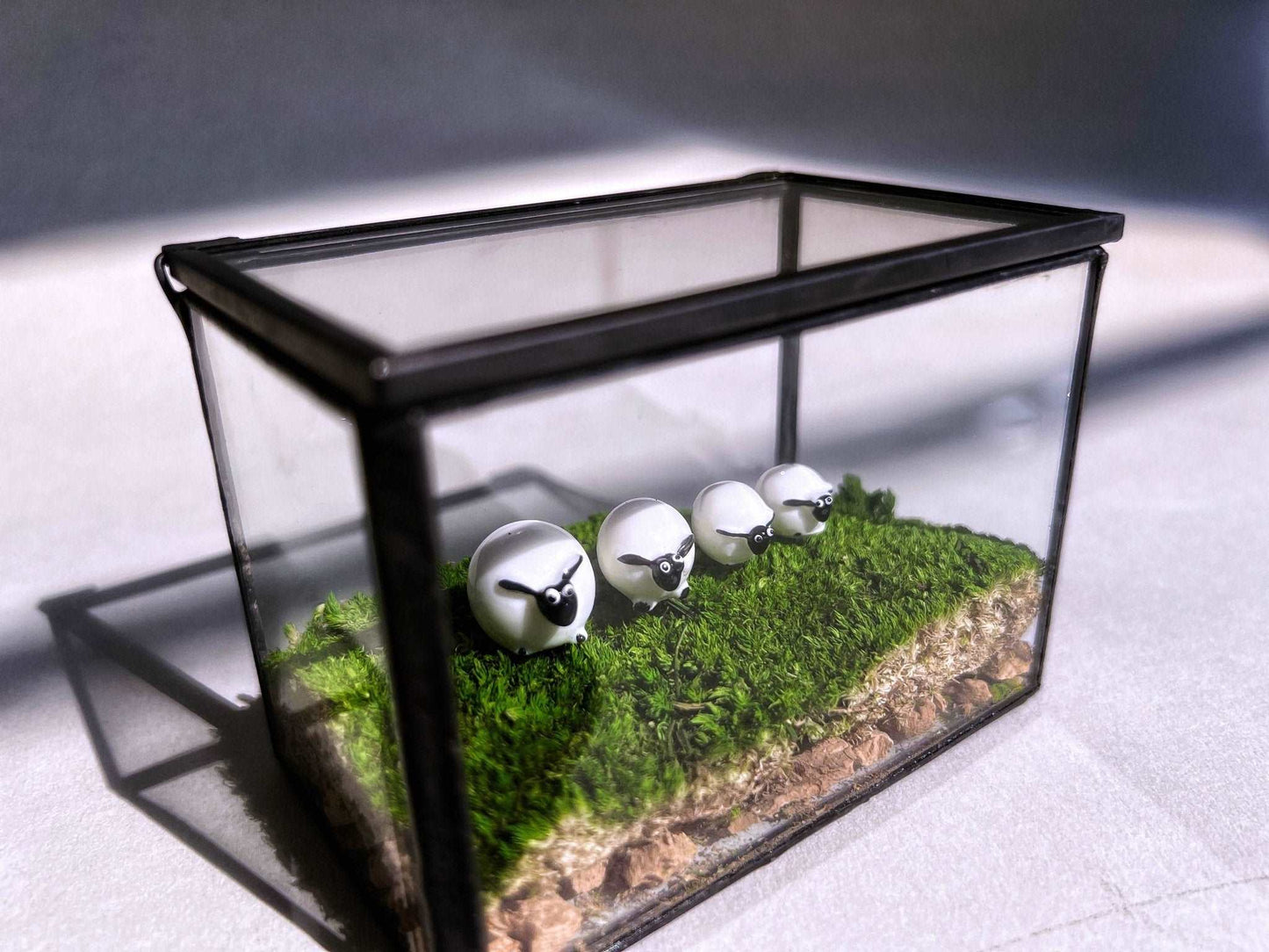 Mossbox Little Sheep Desktop Decoration - Micro Landscape with PreservTransform your desk into a serene pasture with our charming Little Sheep Desktop Decoration. This handcrafted micro landscape lawn, set within a clear glass box, fea