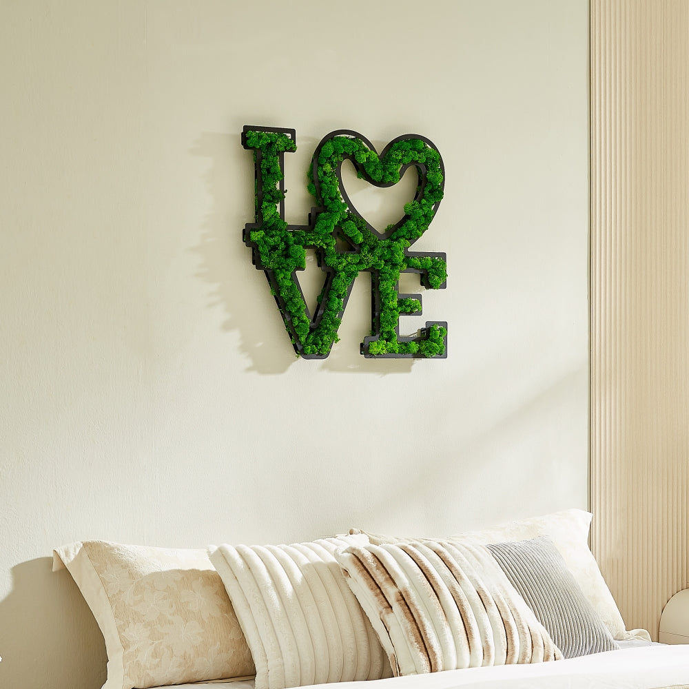 "LOVE" Preserved Moss Wall Art with Wrought Iron FrameOur "LOVE" Moss Wall Decoration is a heartfelt statement piece, meticulously crafted to bring a warm and eco-conscious aesthetic to your space. The lush preserved mo